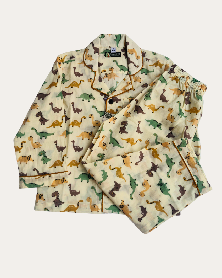 Children's pajama set with dinosaur pattern on a light background