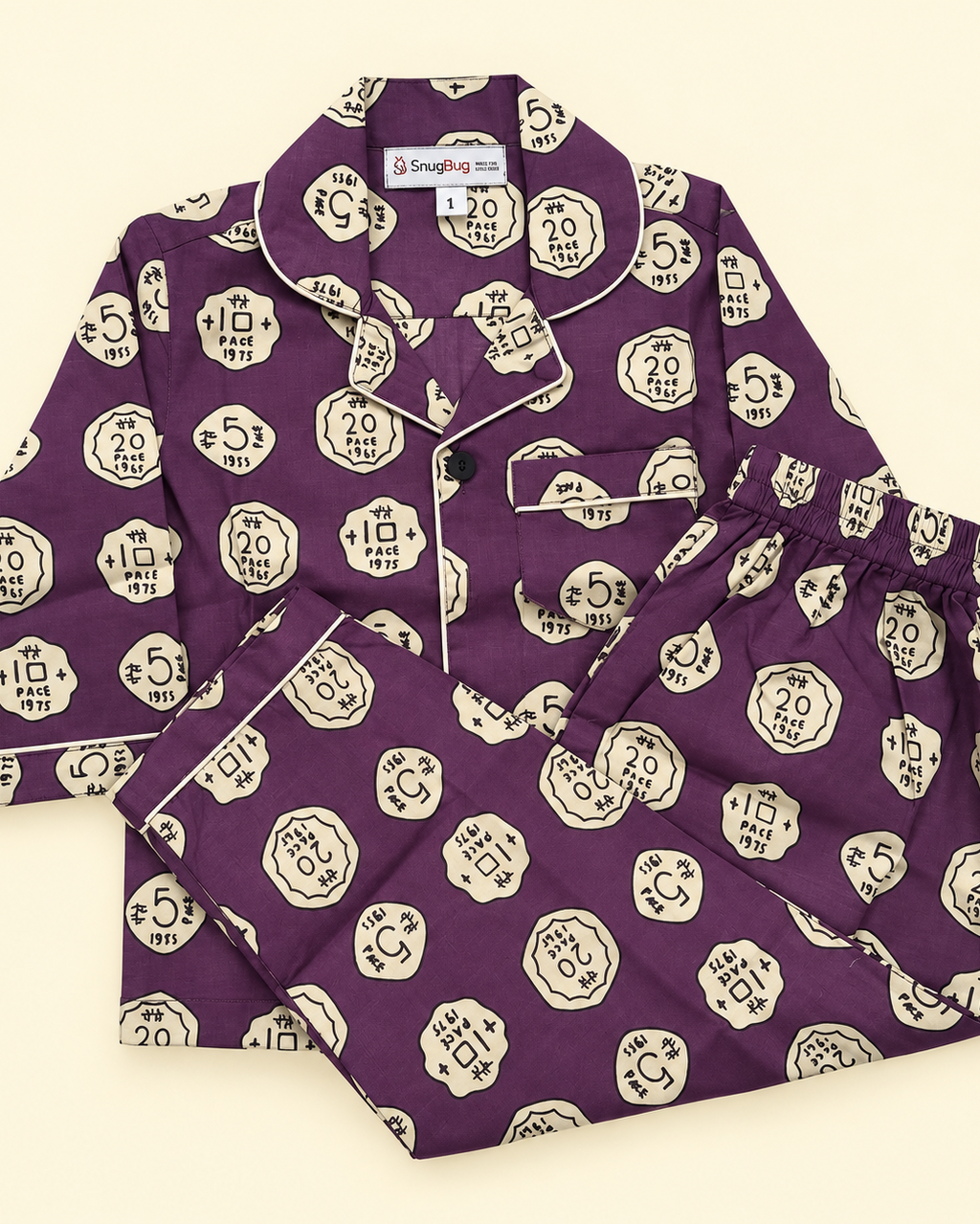 A coin printed NightWear in purple shade from Aruvo laid off on white background