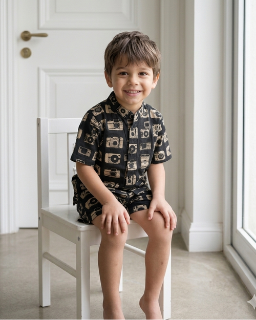 A boy is wearing toddler boys co ord set 