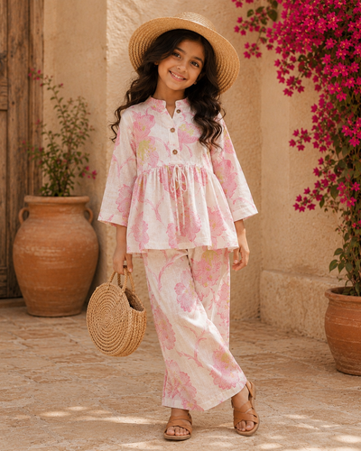Stylish co ord sets girls in breathable pure cotton floral print outfit featuring a peplum top and wide-leg pants, perfect for summer wear and casual outings.