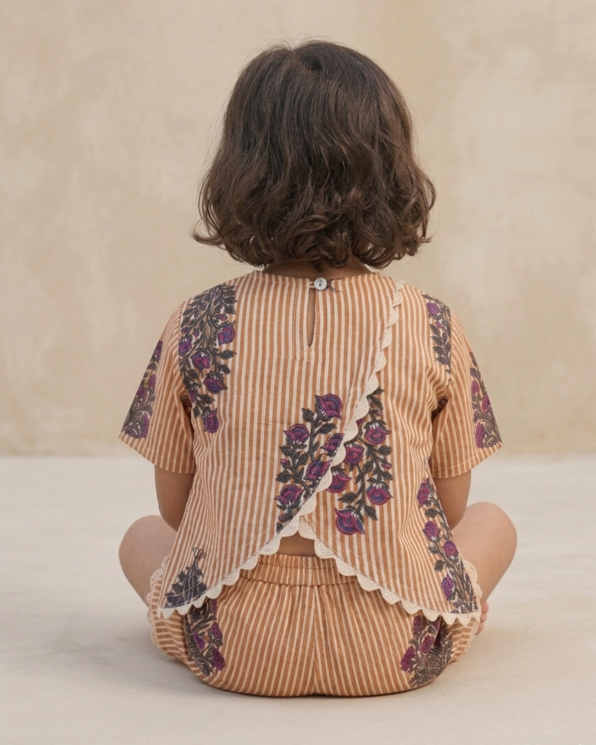 A girl is wearing the summer . pure cotton co-ord set, showing back design