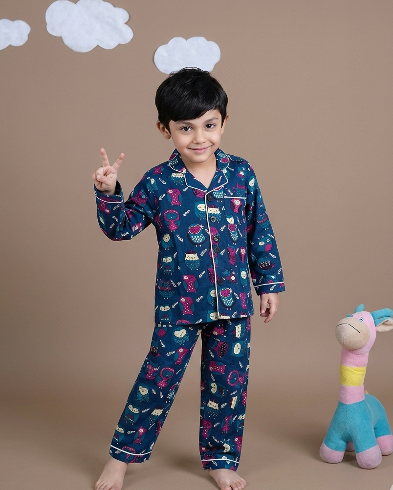 A toddler wearing an owl printed Navy color Premium fabric NIGHTSUIT SEt