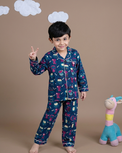 A toddler wearing an owl printed Navy color Premium fabric NIGHTSUIT SEt
