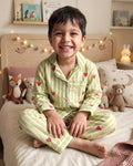 A toddler wearing green heart printed striped pure cotton unisex night suit set