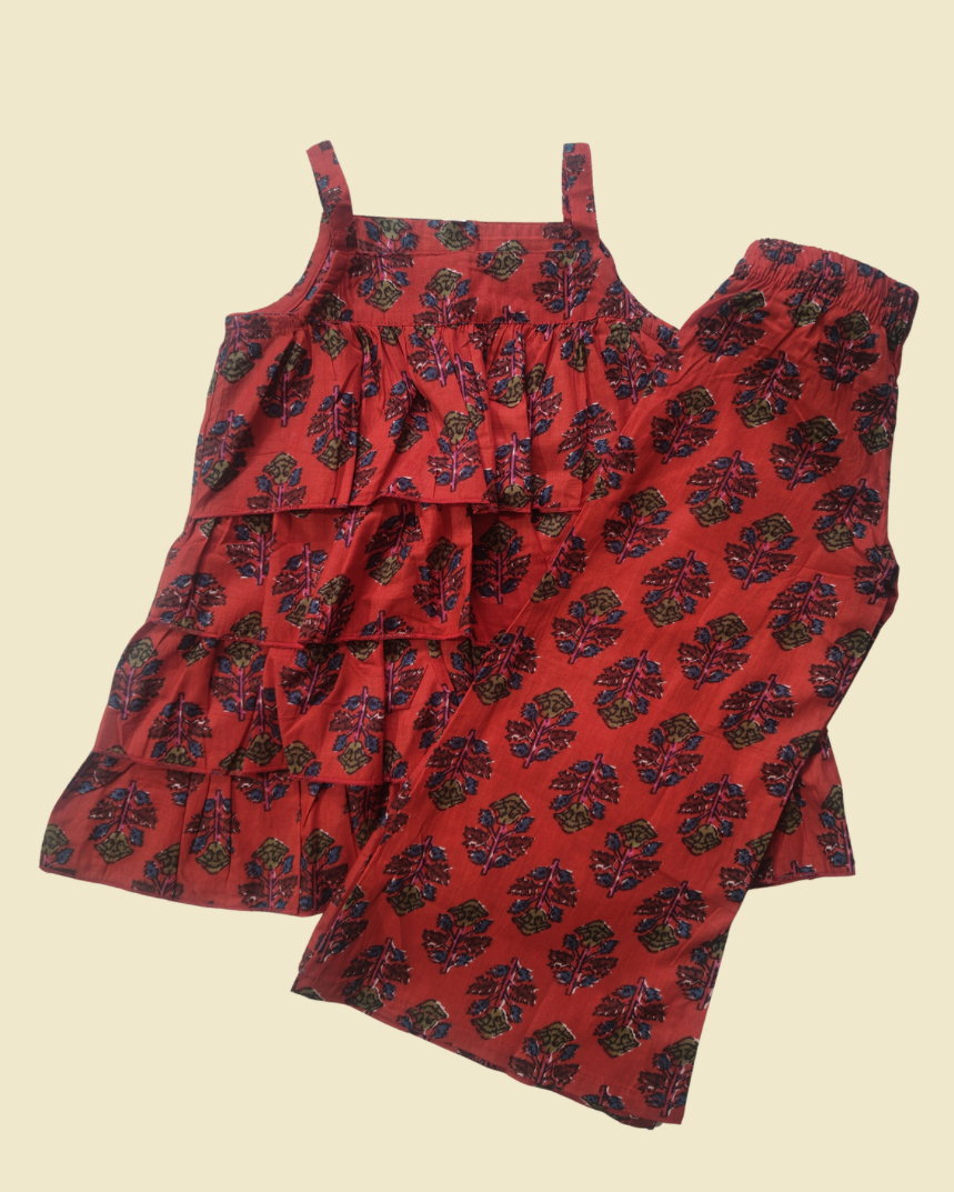 Aruvo Indo-western ruffled Top with matching pant in dark red color and has strapped sleeve