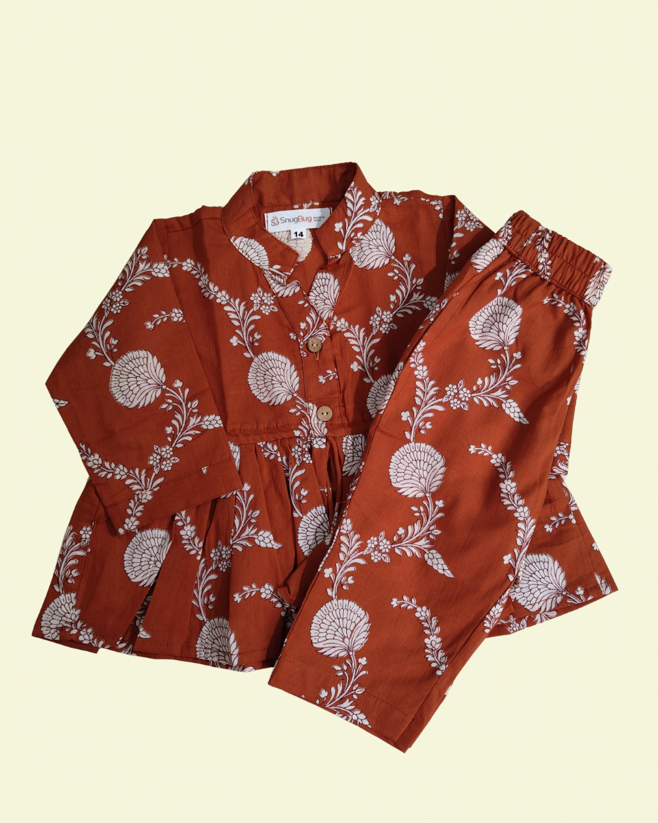 Pure cotton girls matching outfit set with peplum top, three-quarter sleeves and elasticated pants in breathable floral print fabric for casual wear and playdates.
